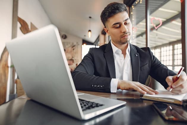 man focused on invoice