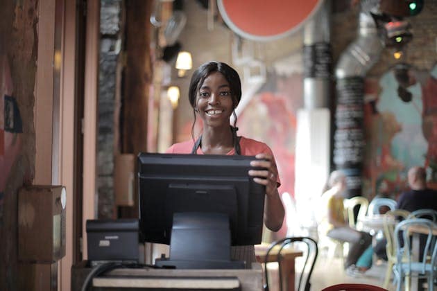 happy employee on computer